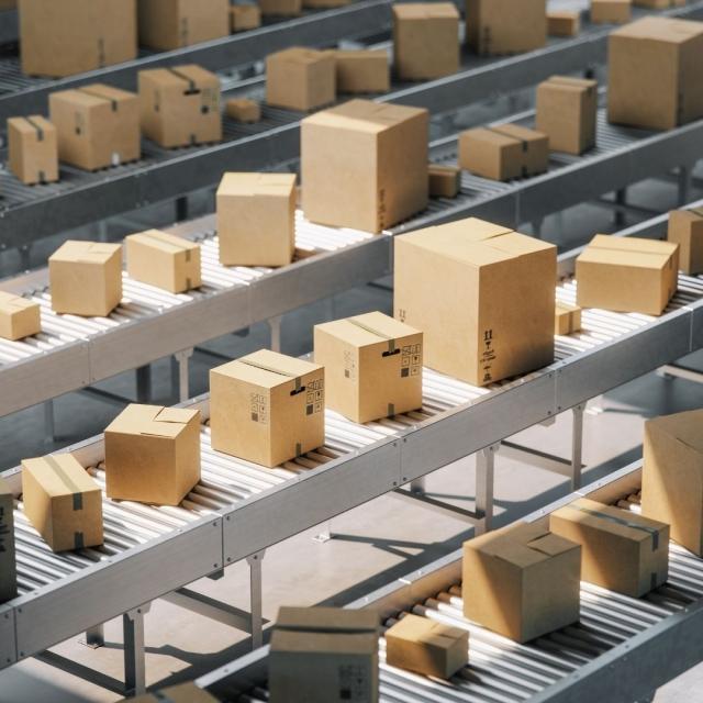 Brown corrugated boxes on a belt